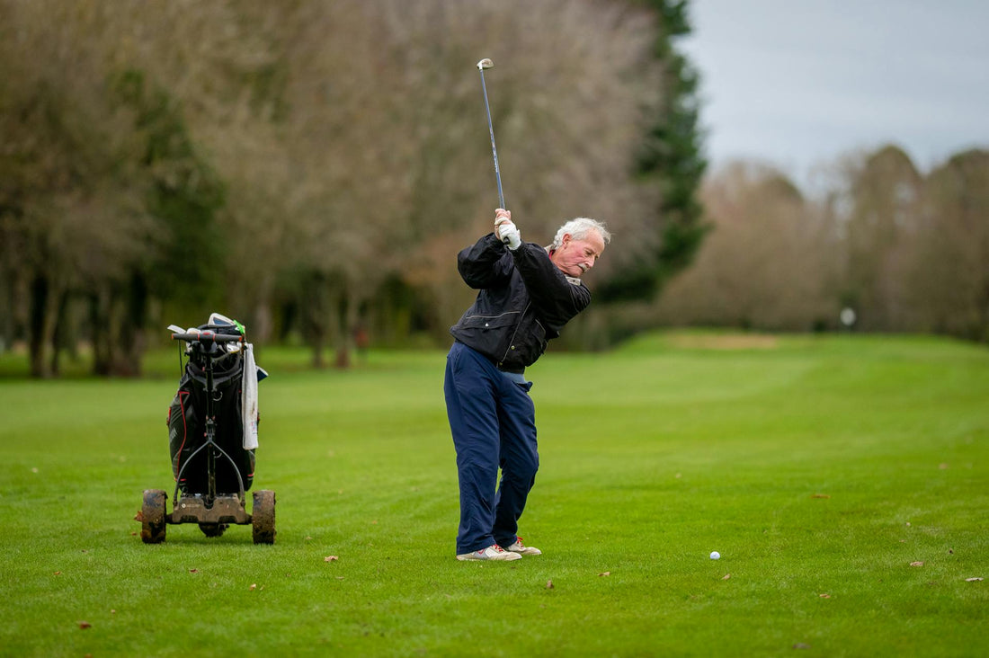 man suffering from golf wrist pain