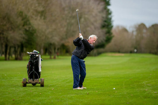 man suffering from golf wrist pain