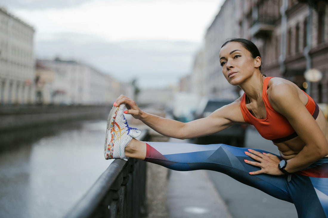 A person stretching and thinking about CBD and running