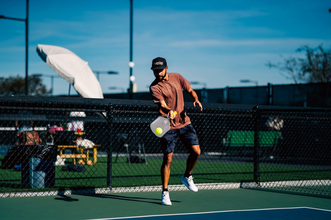 Man playing pickleball with knee pain