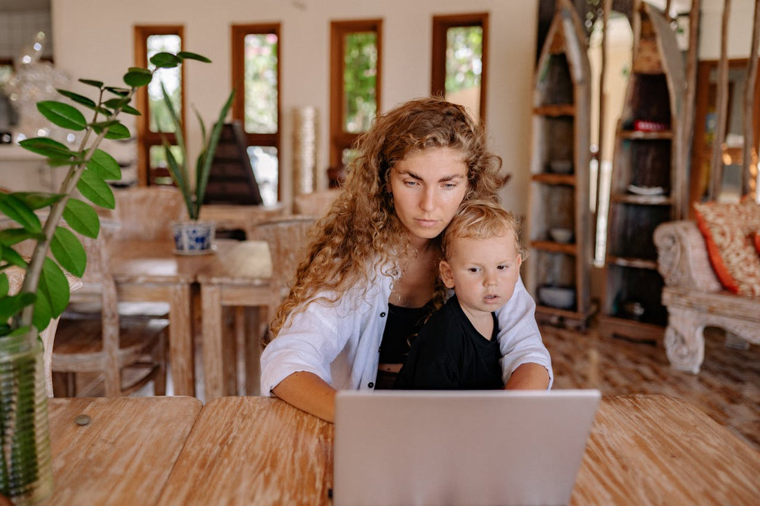 Mom using CBD for focus and working on a computer