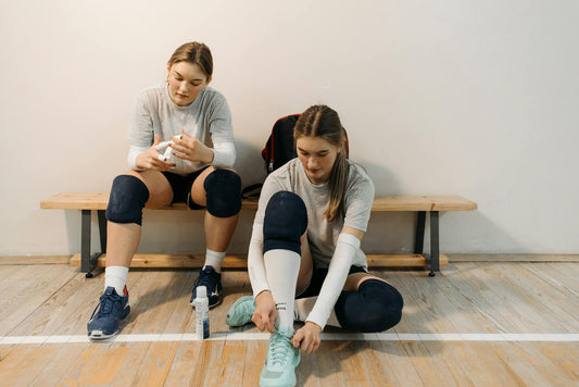 Pain relief cream for athletes being applied