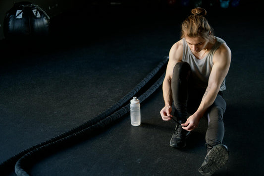 Person taking CBD before a workout