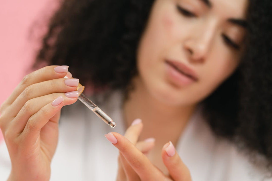 Woman putting CBG on her finger